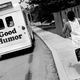 A 10-year-old boy runs as he yells for the ice cream truck to stop (it did). Laurel, Maryland, 1998